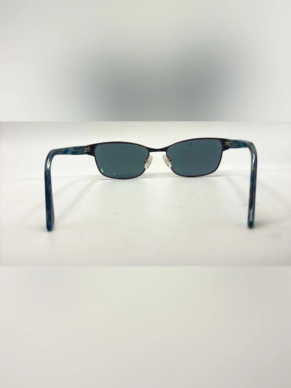 Nicole Miller listing pair